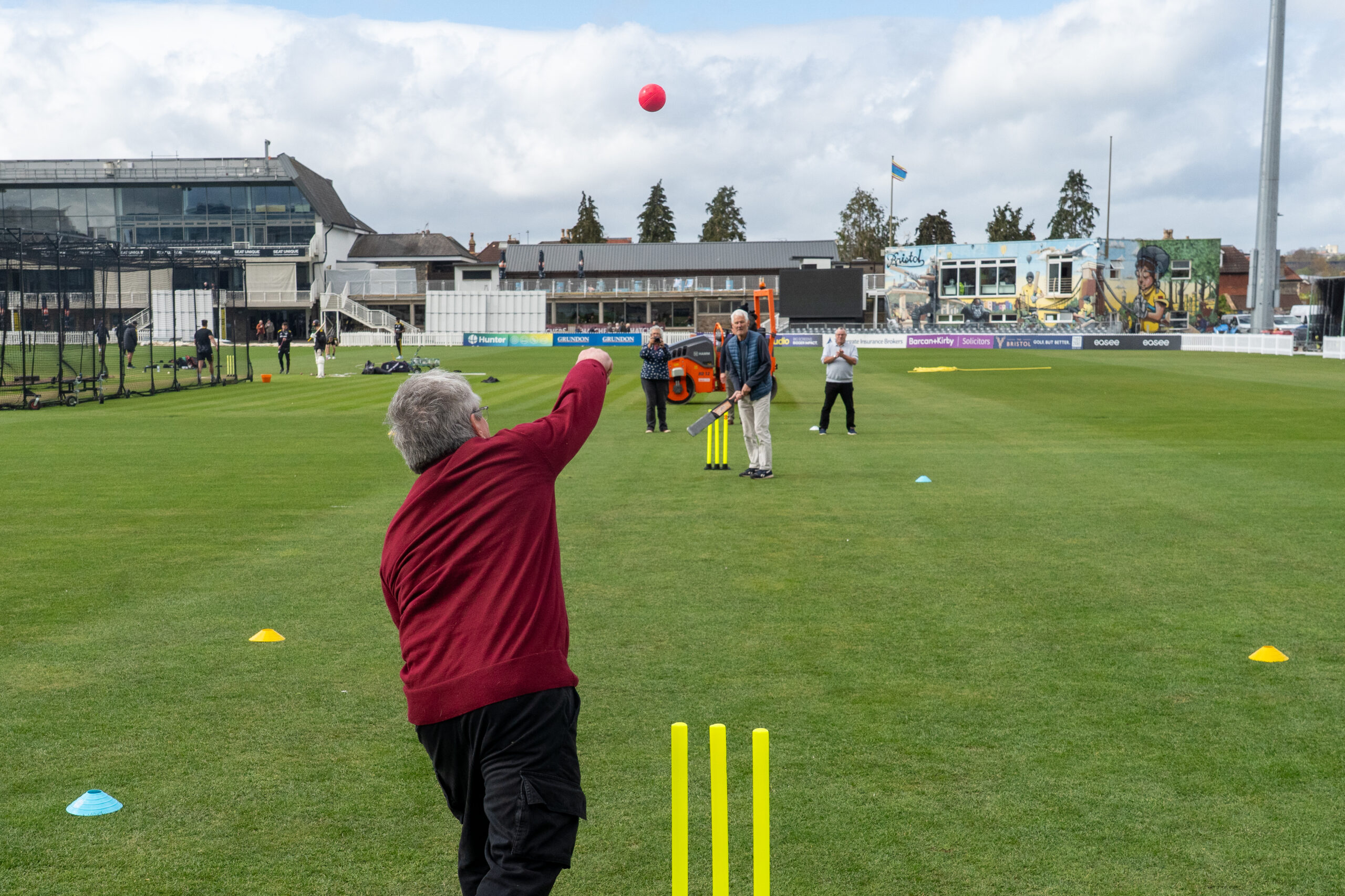 A man bowls a loopy delivery during a walkers and talkers walking cricket taster session