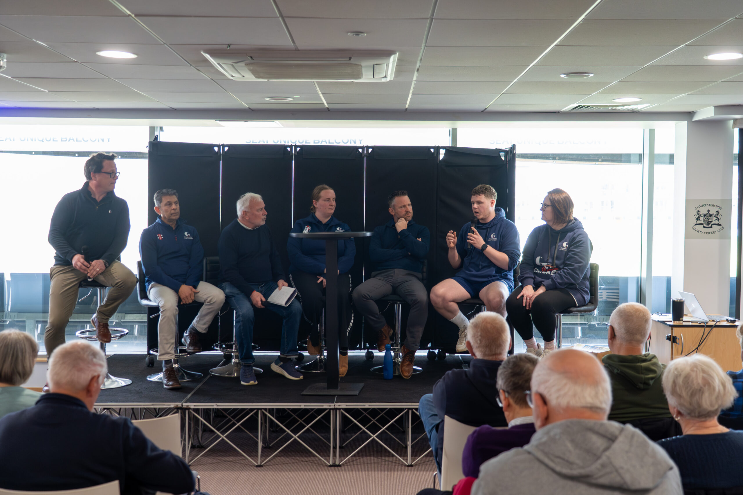 Members of the GCF sit on a panel answering questions during a walkers and talkers session