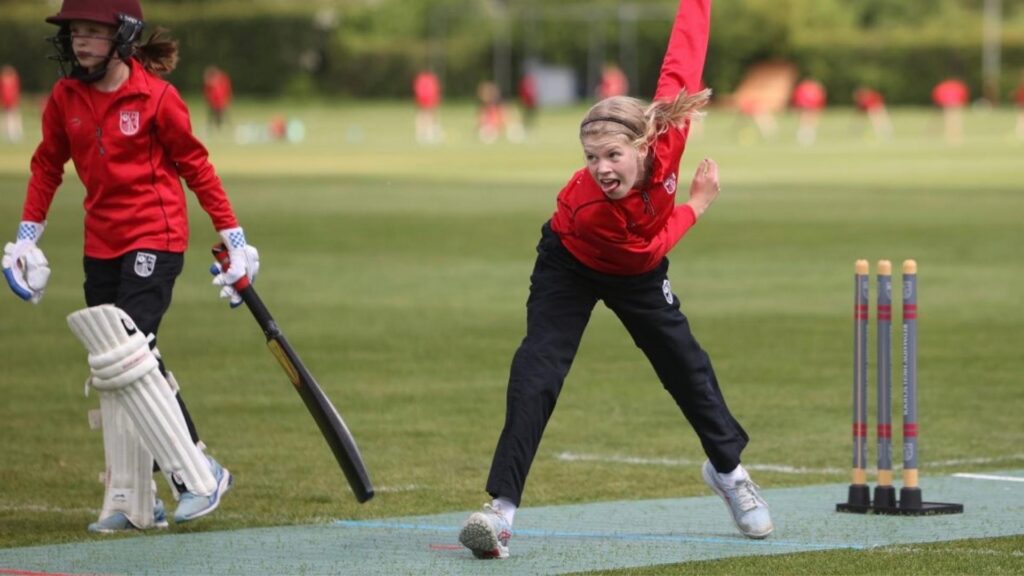 Redmaids student bowling on a 2G Flix pitch