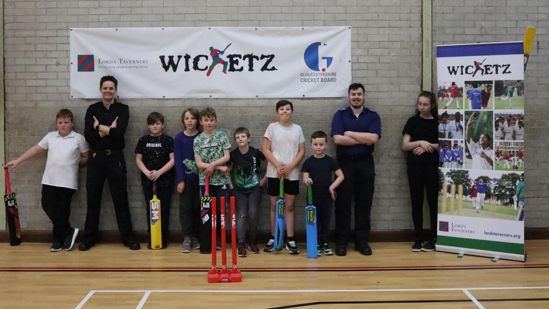 Wicketz participants photo with the police